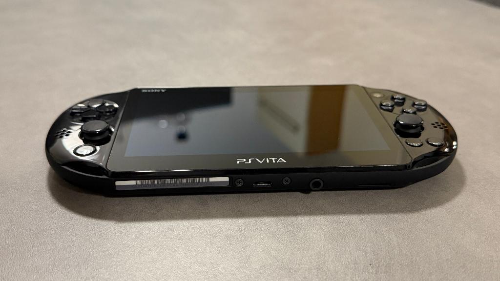 PS Vita Slim Zwart in uitstekende staat met games, Spelcomputers en Games, Spelcomputers | Sony PlayStation Vita, Ophalen of Verzenden