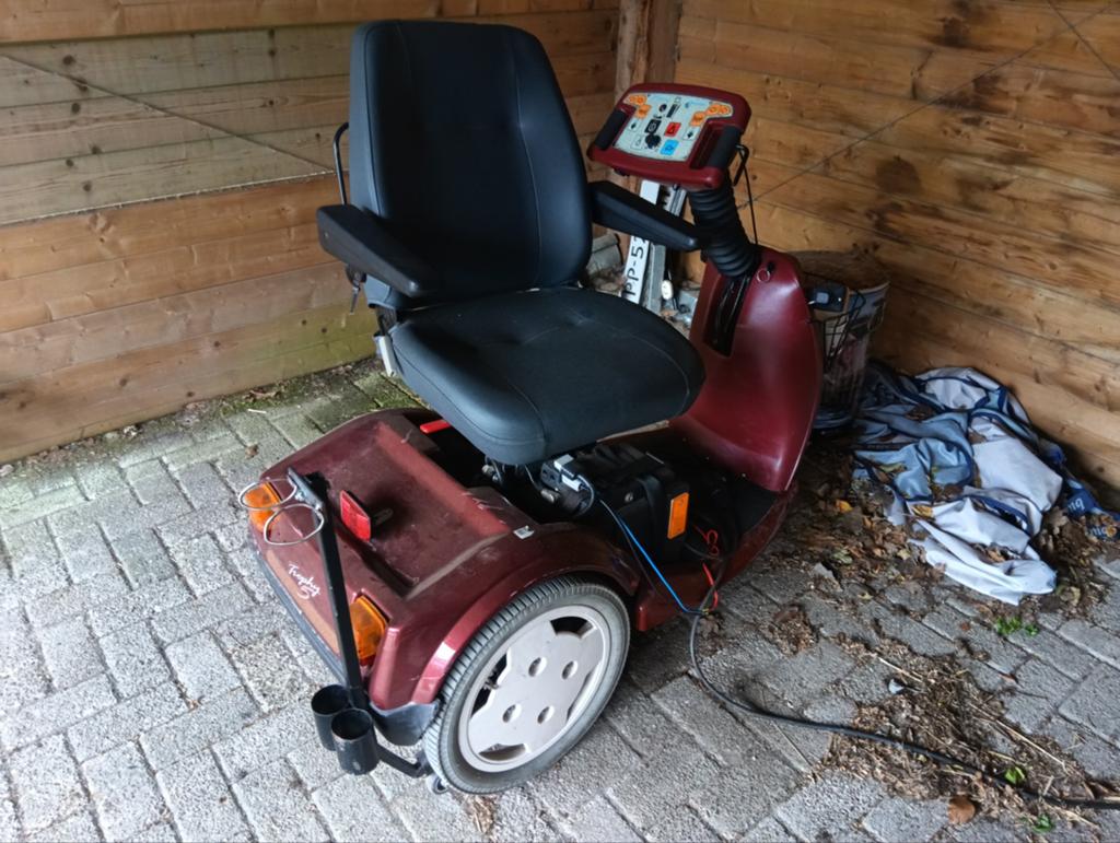 Scootmobiel doet wat i moet doen met lader, Ophalen, Gebruikt