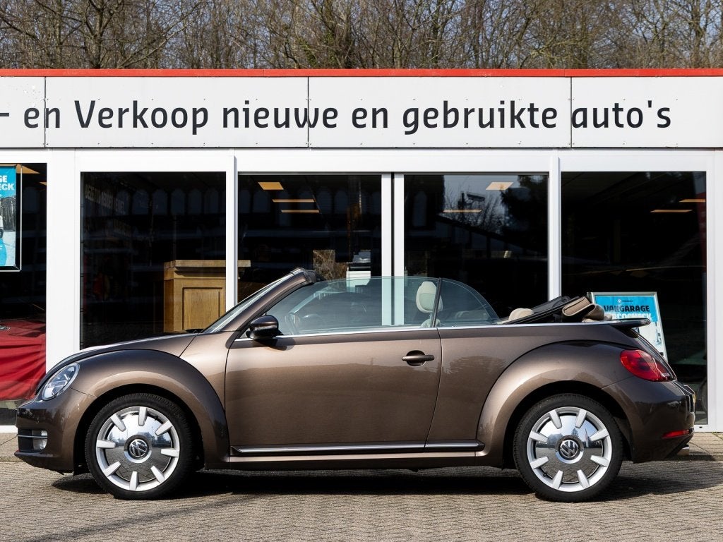 Volkswagen Beetle Cabriolet 1.2 TSI Design BlueMotion, Auto's, Volkswagen, Voorwielaandrijving, Euro 5, Stof, Gebruikt