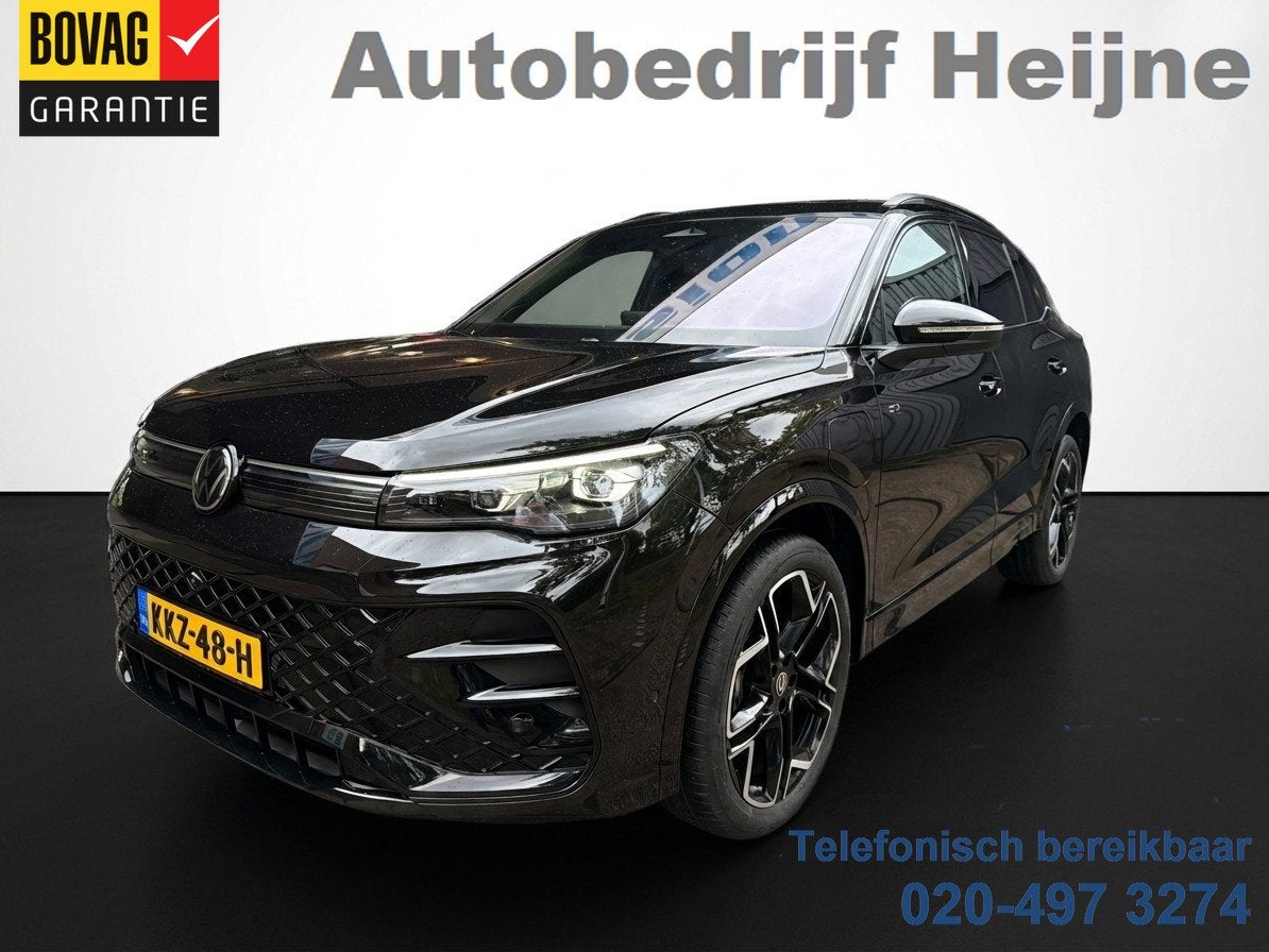 Volkswagen Tiguan 1.5 eHybrid 272PK DSG R-LINE SPORT LEDER/H, Auto's, Euro 6, 4 cilinders, Zwart, Hybride Elektrisch/Benzine