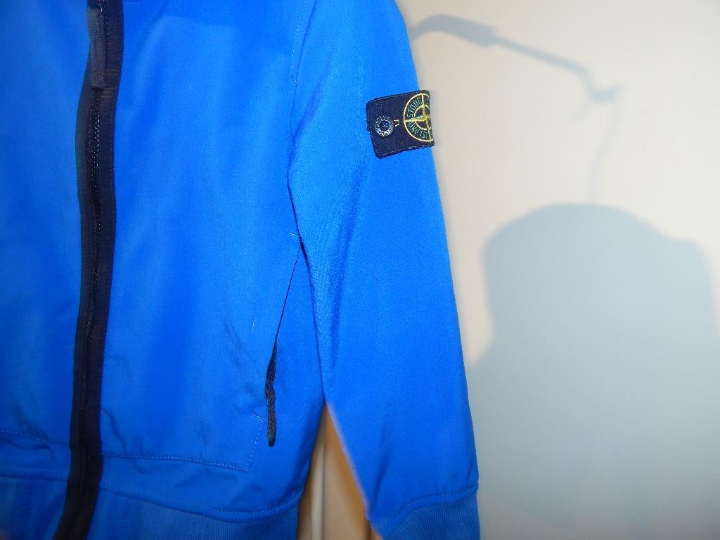 Stone Island kobalt blauw soft shell jack jas mt 128, Gebruikt, Verzenden, Stone Island, Jongen