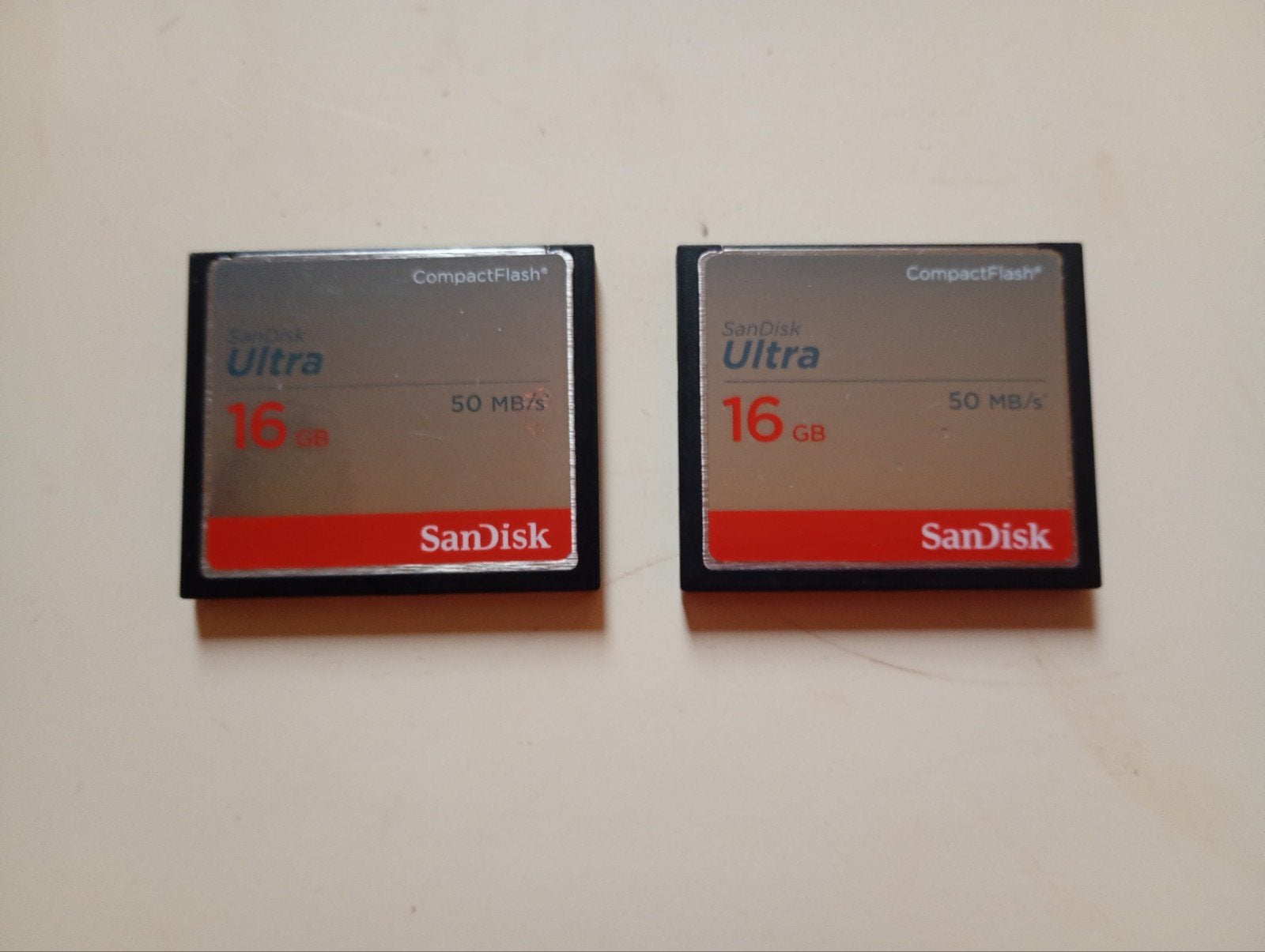 2x CompactFlash Sandisk "Ultra" 16GB, Audio, Tv en Foto, Ophalen of Verzenden, Zo goed als nieuw, 16 GB, Fotocamera
