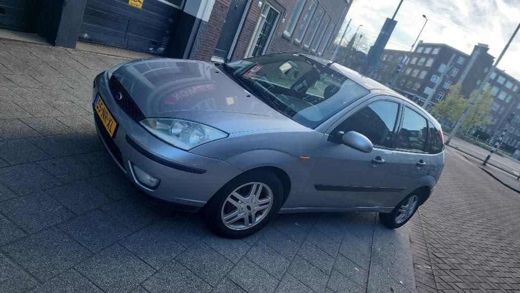 Ford Focus 1.6 2004 (APK tot 25-03-2027), Auto's, Ford, Stof, Handgeschakeld, Grijs, Particulier
