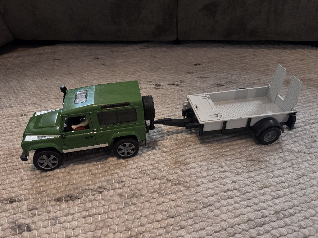 Bruder Land Rover Defender met aanhanger en figuur (1:16), Ophalen of Verzenden, Gebruikt