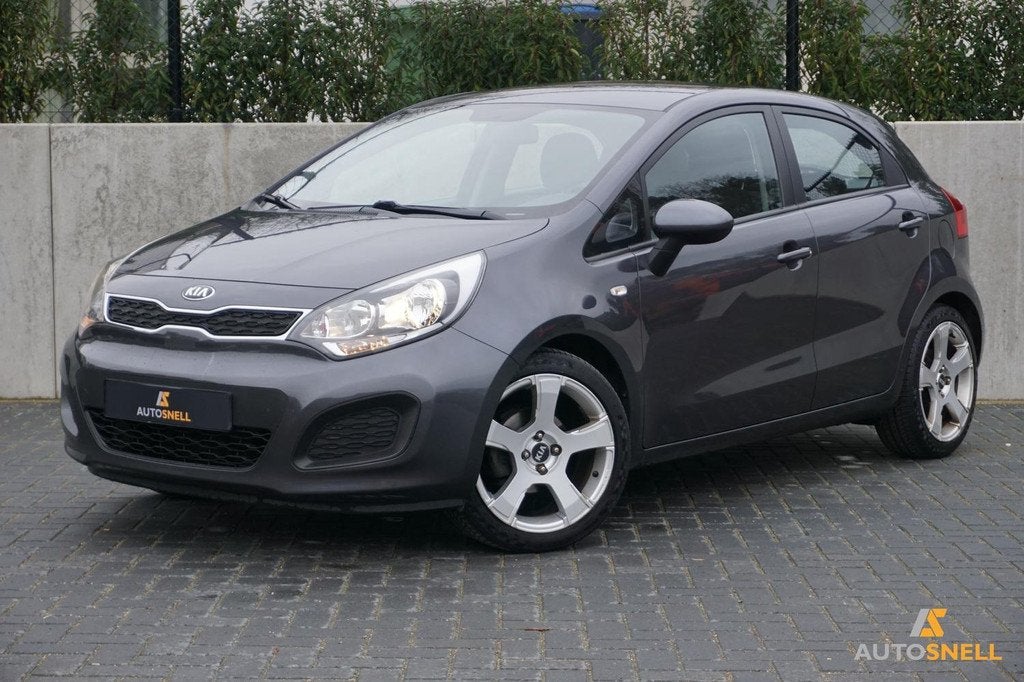 Kia Rio 1.2 CVVT Comfort Pack 2014 1e eigenaar | Dealerauto!, Auto's, Kia, 4 cilinders, Origineel Nederlands, Handgeschakeld, Grijs