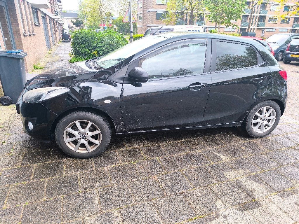 Mazda 2 1.3 Bifuel 62KW/84pk 5DRS 2013 Zwart LPG, Auto's, Voorwielaandrijving, Euro 5, 37 €/maand, Zwart
