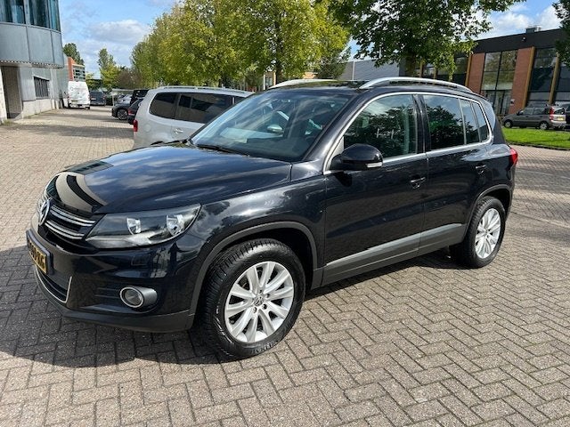 Volkswagen Tiguan 2.0 TSI Sport&St.4M 180PK CAMERA CARPLAY S, Auto's, Automaat, Euro 5, Stof, Gebruikt