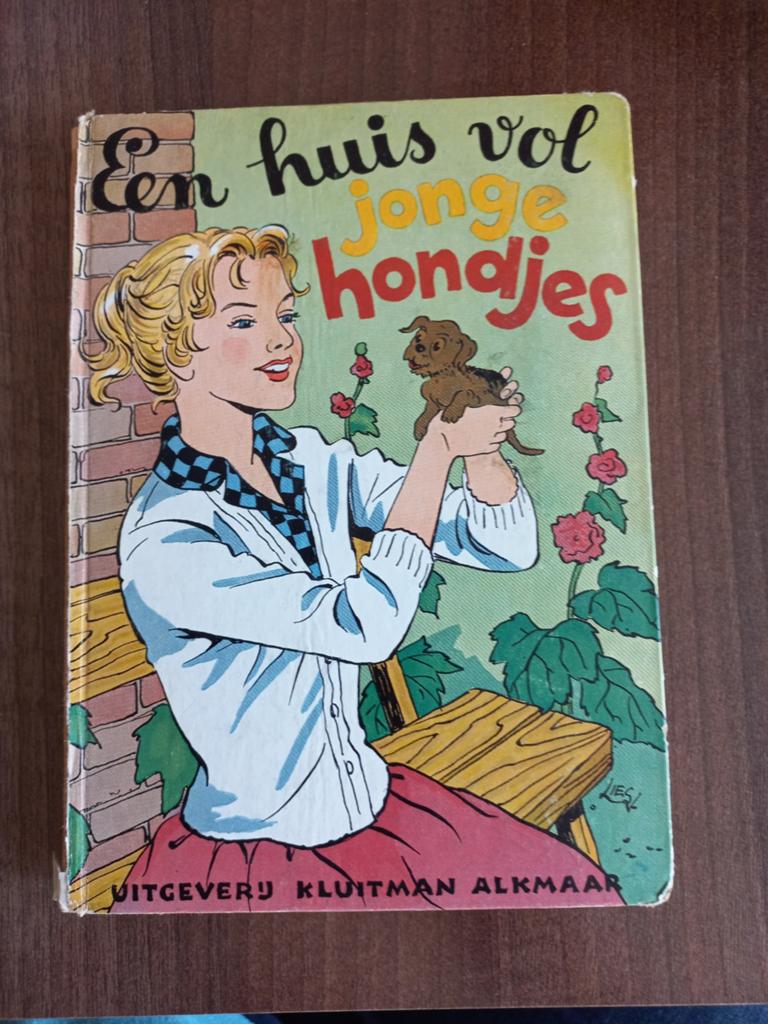 Een huis vol jonge hondjes,  Antoinette P. Schelling, Ophalen of Verzenden, Gelezen