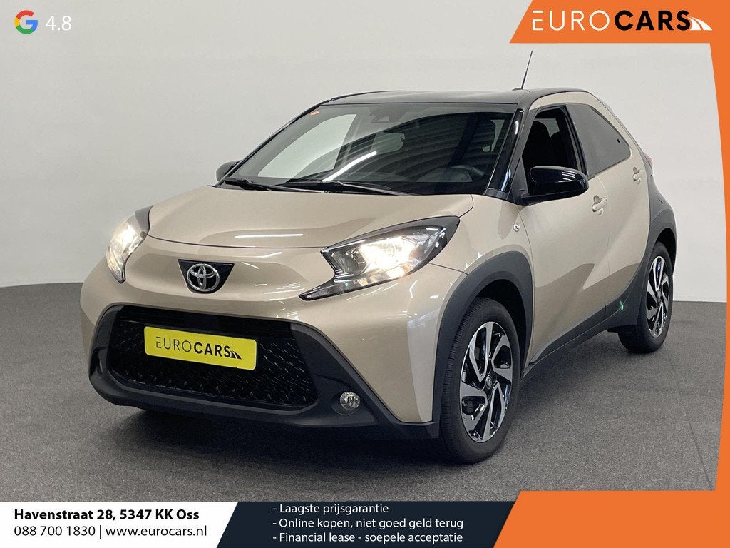 Toyota Aygo X 1.0 VVT-i Automaat Pulse Navigatie Apple Carpl, Auto's, Toyota, Stof, Gebruikt, Bruin, 4 stoelen