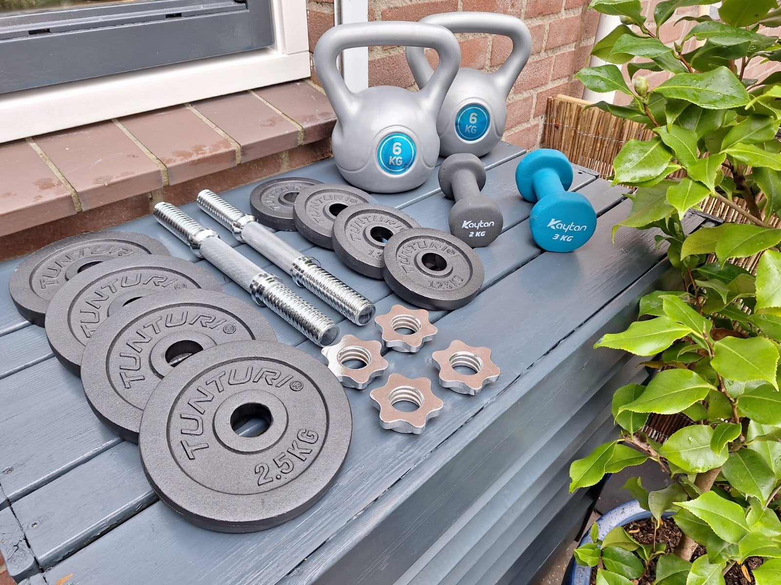 Tunturi halterset met dumbels etc., Ophalen, Zo goed als nieuw, Halterset