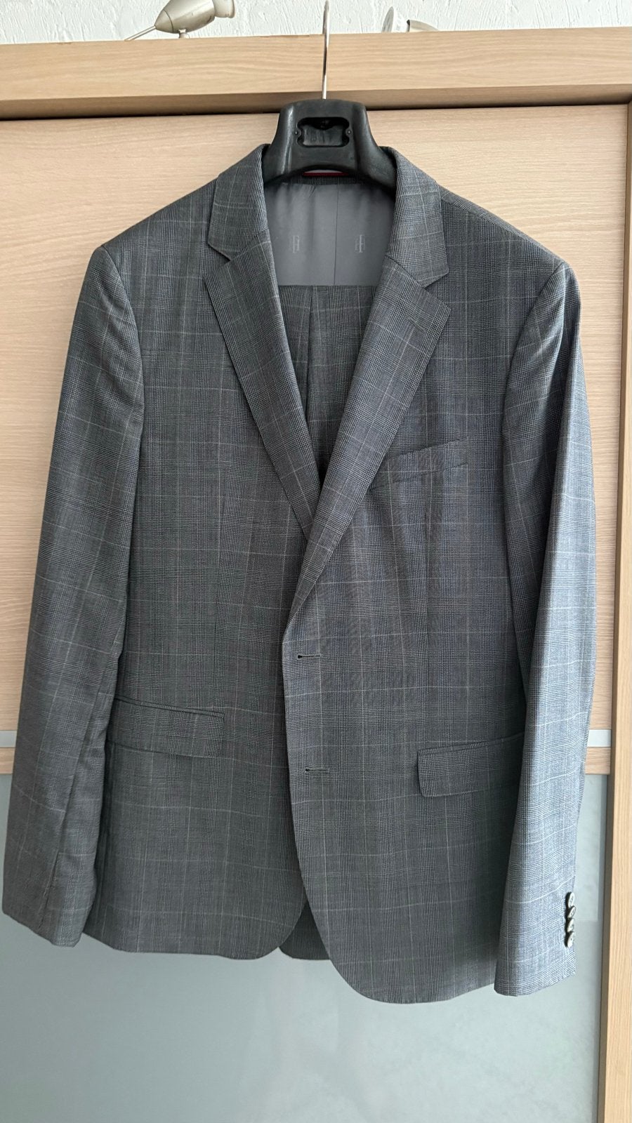 Tommy Hilfiger Tailored pak - Maat 52 (L), Ophalen of Verzenden, Zo goed als nieuw, Maat 52/54 (L), Grijs