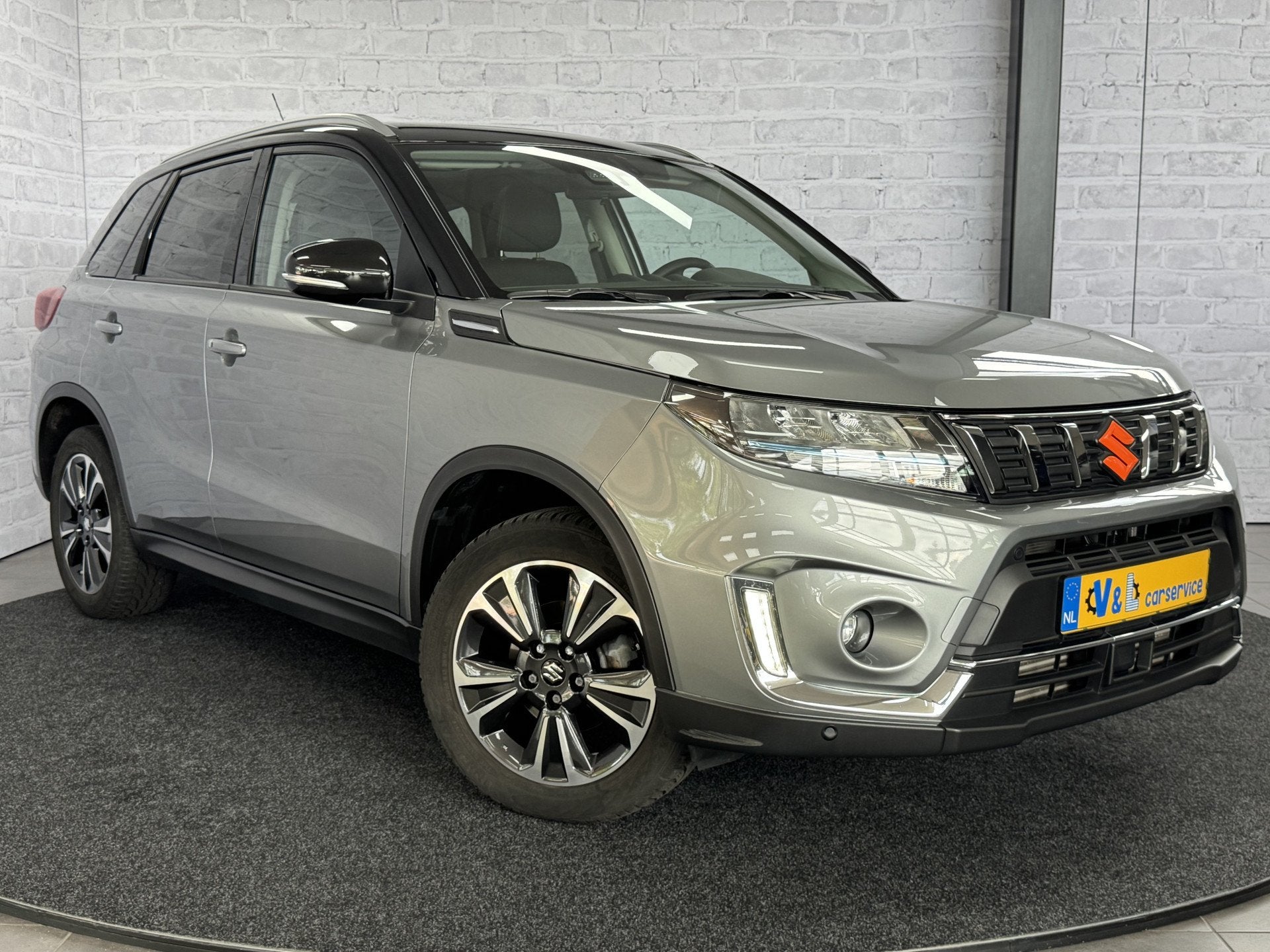 Suzuki Vitara 1.4 Boosterjet Style Smart Hybrid AllGrip 4x4, Auto's, Gebruikt, 4 cilinders, 129 pk, 400 kg