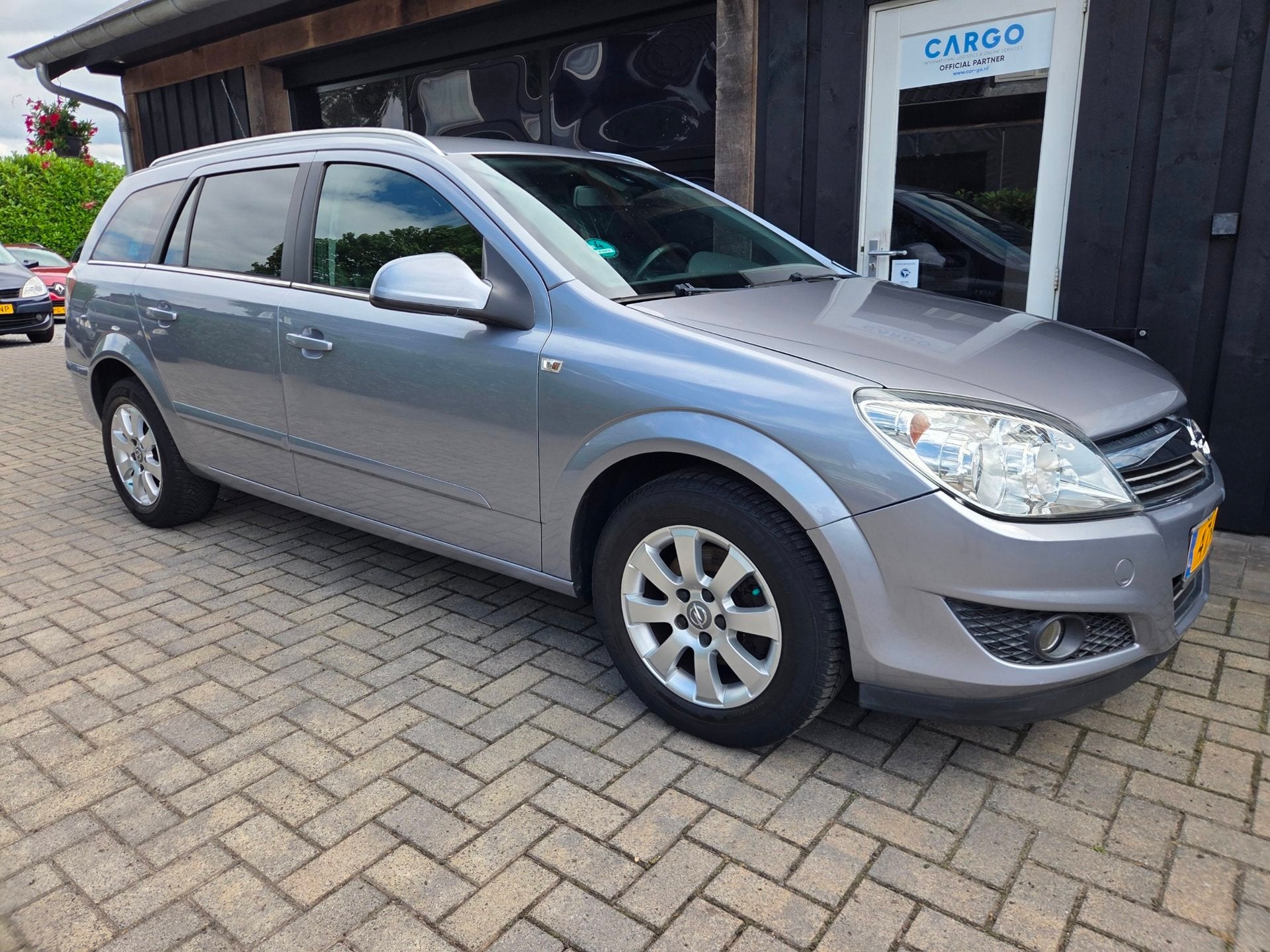 Opel Astra Wagon 1.8 Cosmo, Auto's, Opel, Voorwielaandrijving, Gebruikt, Parkeersensor, 1796 cc