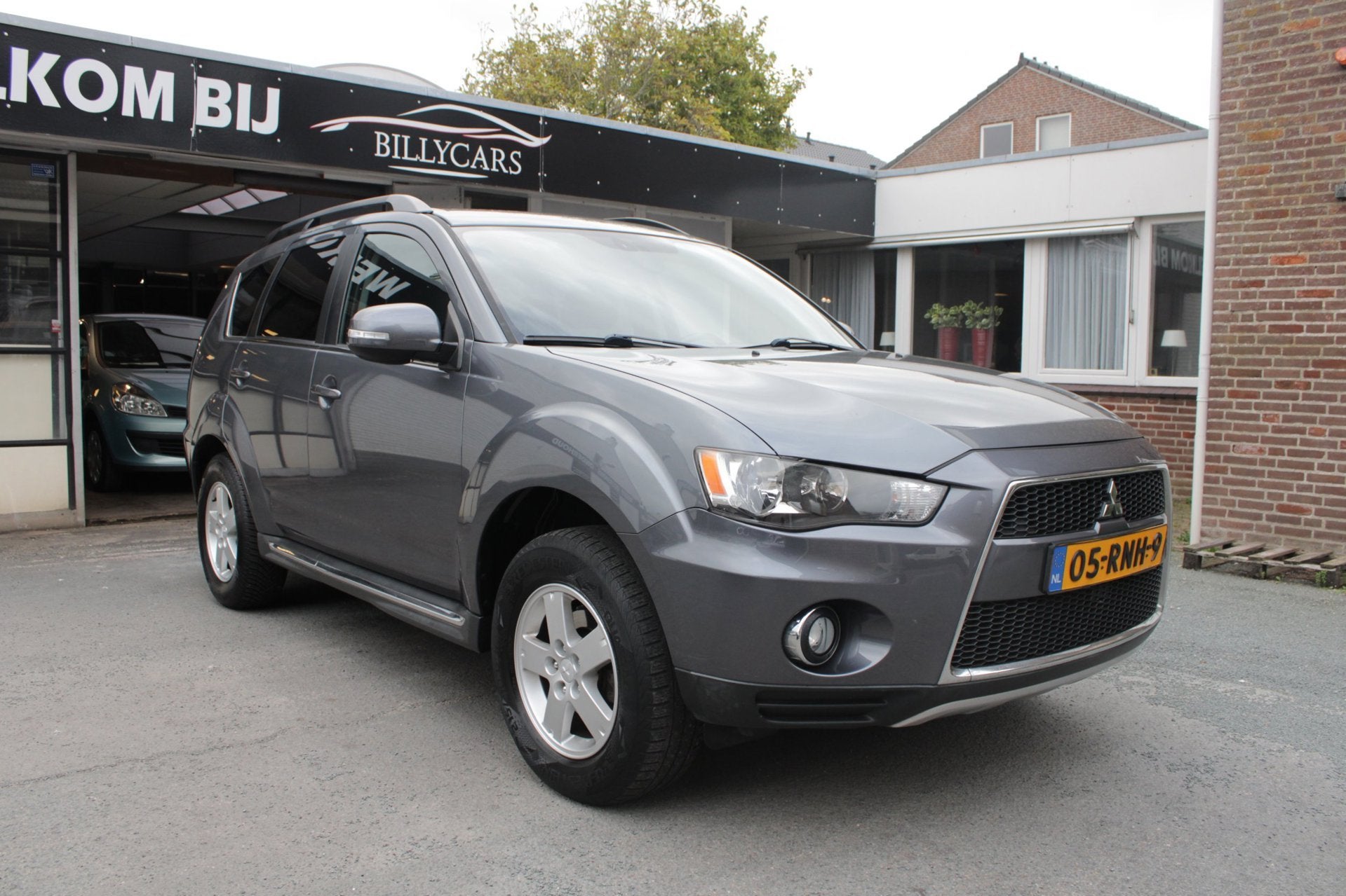 Mitsubishi Outlander 2.0 Intro Edition / AUTOMAAT / CruiseCo, Auto's, Zwart, 4 cilinders, Leder en Stof, Origineel Nederlands