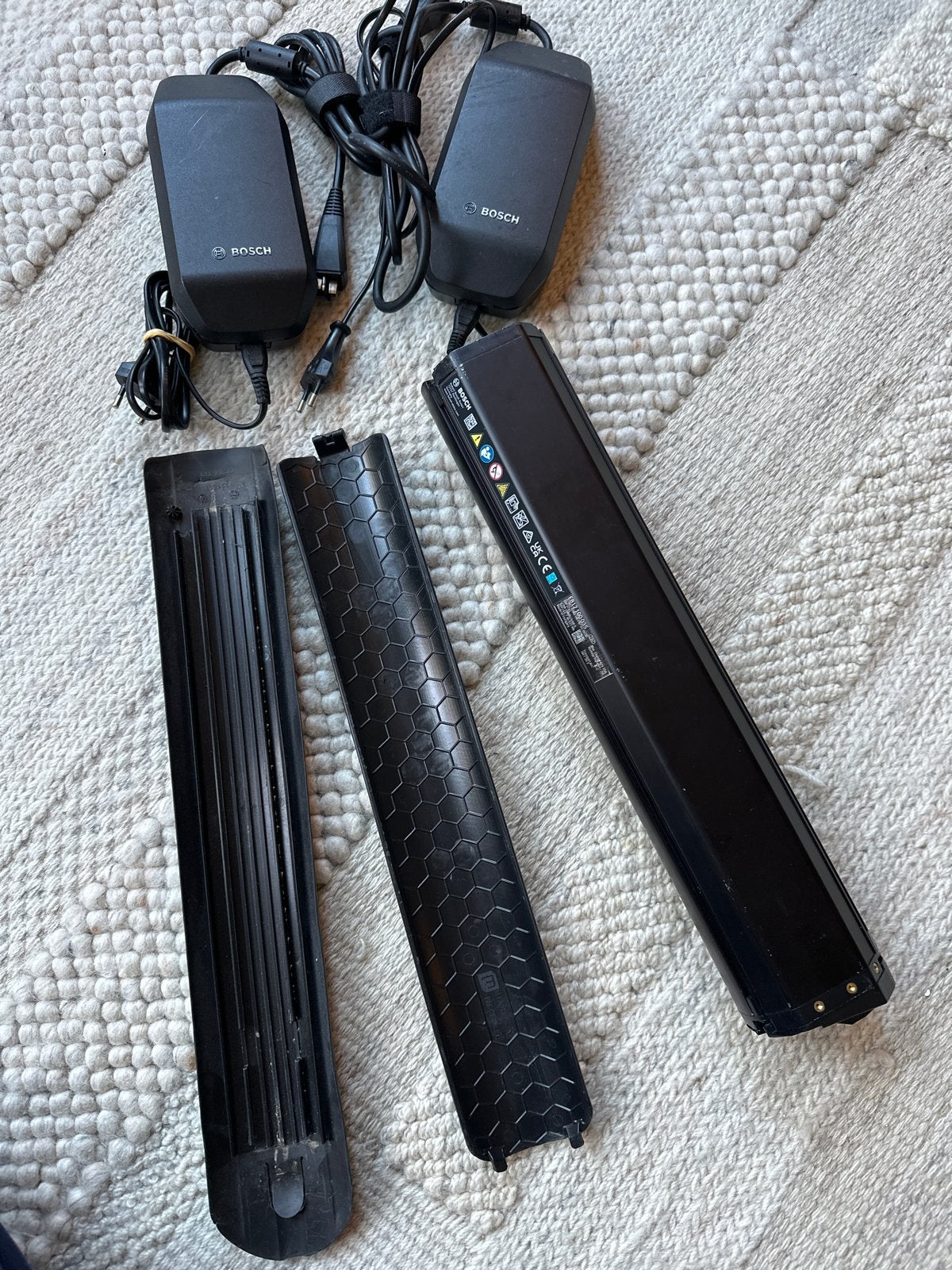 Bosch PowerTube 625 accu met laders en beschermhoezen, Gebruikt