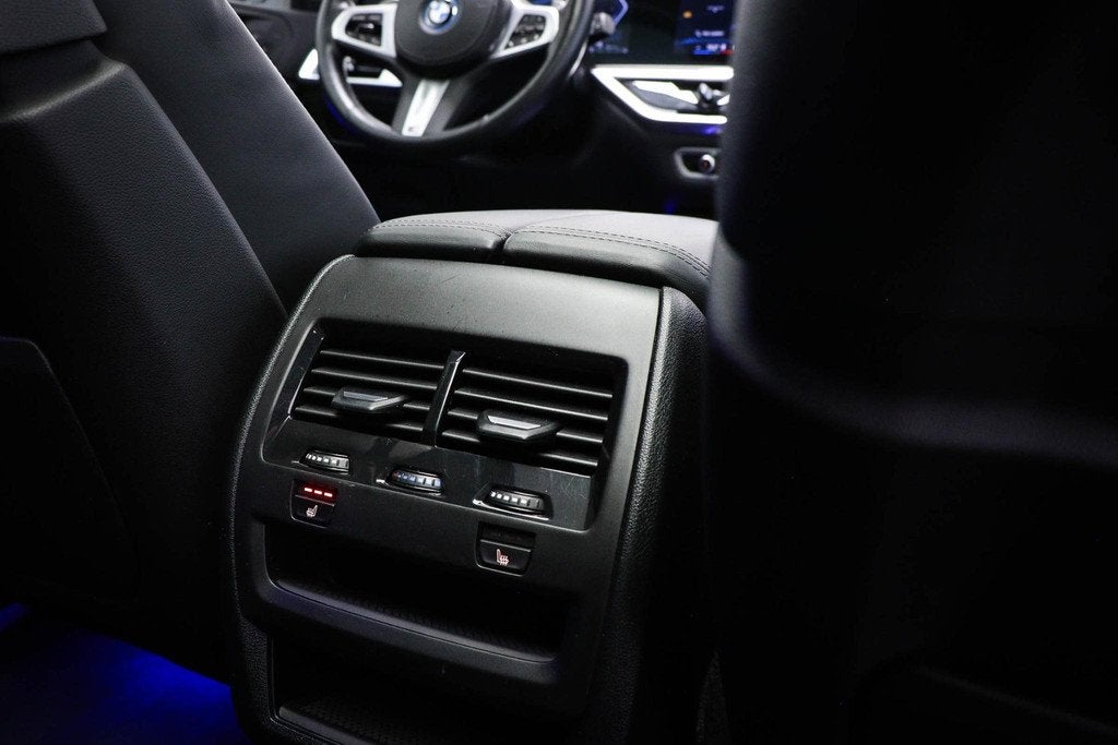 BMW X5 xDrive50e | PANORAMADAK | ACHTERBANKVERWARMING | INDI, Gebruikt, 2395 kg, Met garantie (alle), Zwart