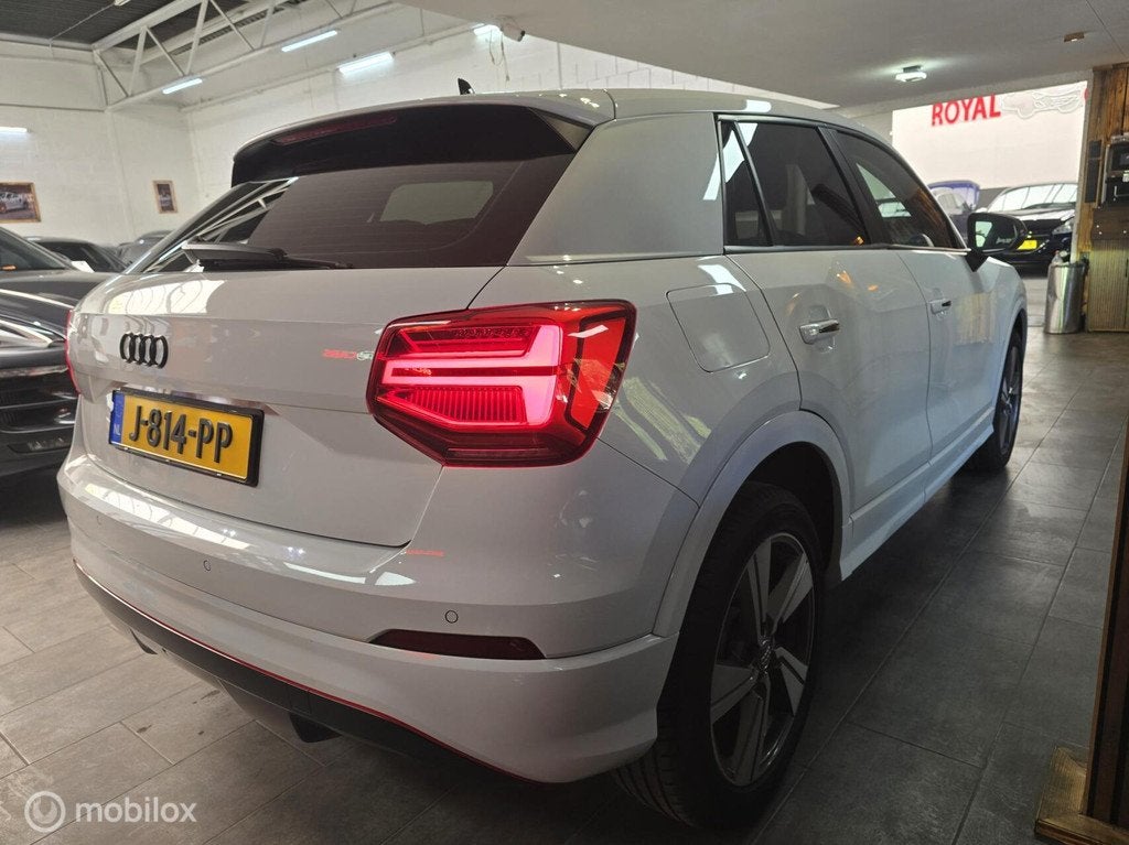 Audi Q2 35 TFSI / lederen Bekleding/ Navi / DSG/ Org NL Auto, Auto's, Audi, 15 km/l, 4 cilinders, 150 pk, Wit