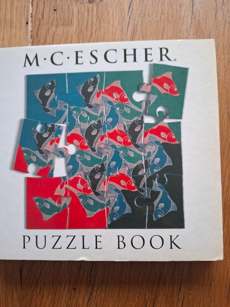 Een puzzelboek van M.C. Escher, Ophalen of Verzenden, Zo goed als nieuw
