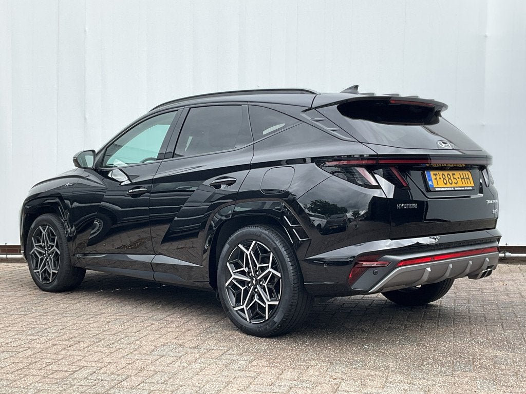 Hyundai Tucson 1.6 T-GDI PHEV 271pk Premium Sky 4WD Pano Lee, Auto's, Hyundai, 1350 kg, Gebruikt, Euro 6, 4 cilinders