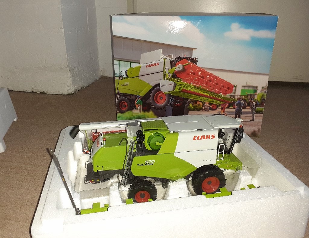 Claas tucano 570 met v930 combine - Wiking, Ophalen of Verzenden, Nieuw, Tractor of Landbouw, Overige merken