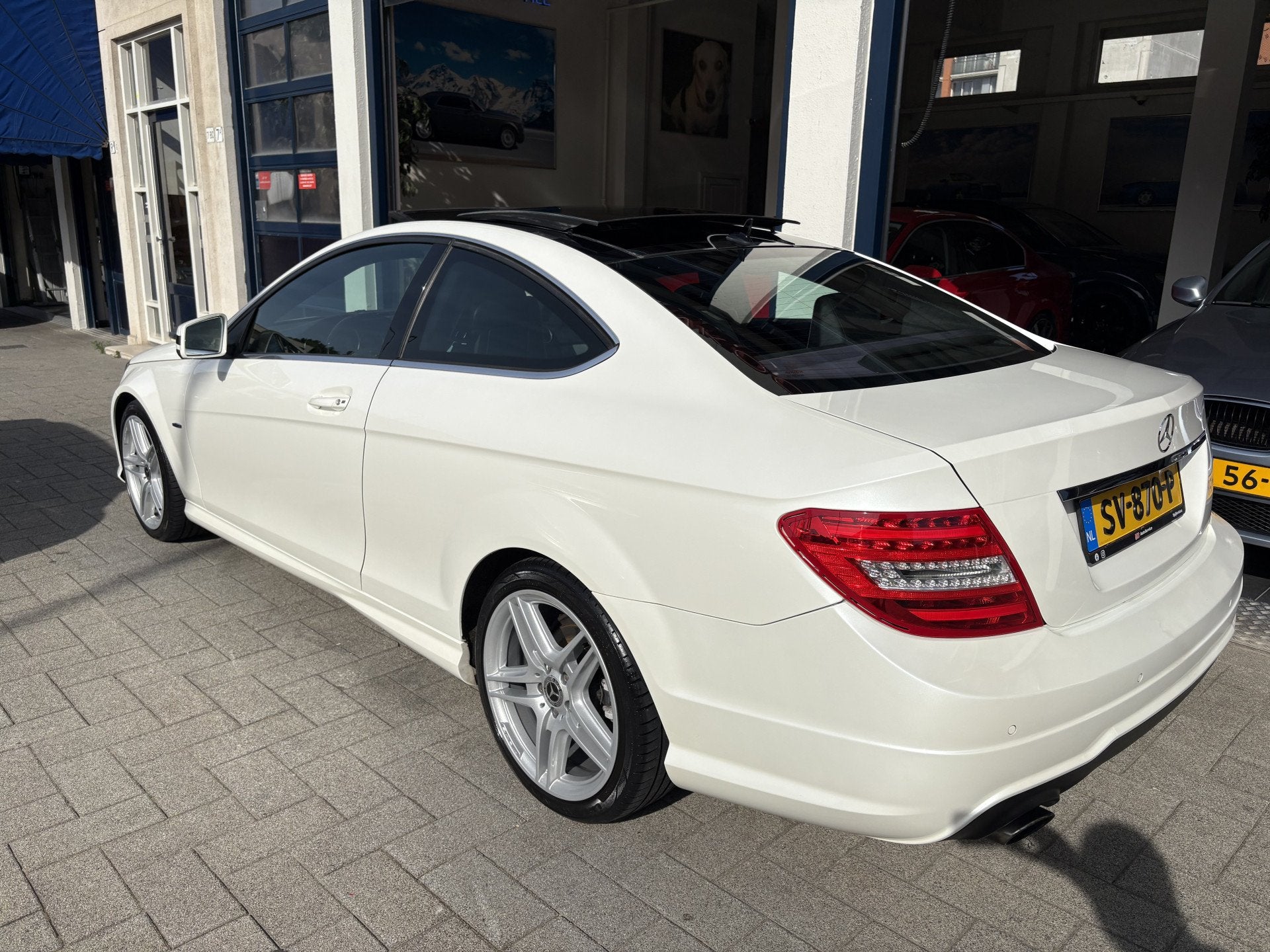 Mercedes-Benz C-Klasse Coupé 180 Ambition AMG/PANORAMA/LEDE, Euro 5, Achterwielaandrijving, Zwart, 4 stoelen