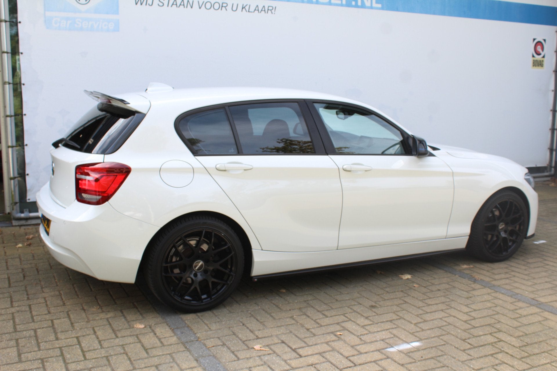 BMW 1-serie 114i EDE Executive | Cruise controle | Parkeerse, Auto's, 1-Serie, Gebruikt, 4 cilinders, Wit