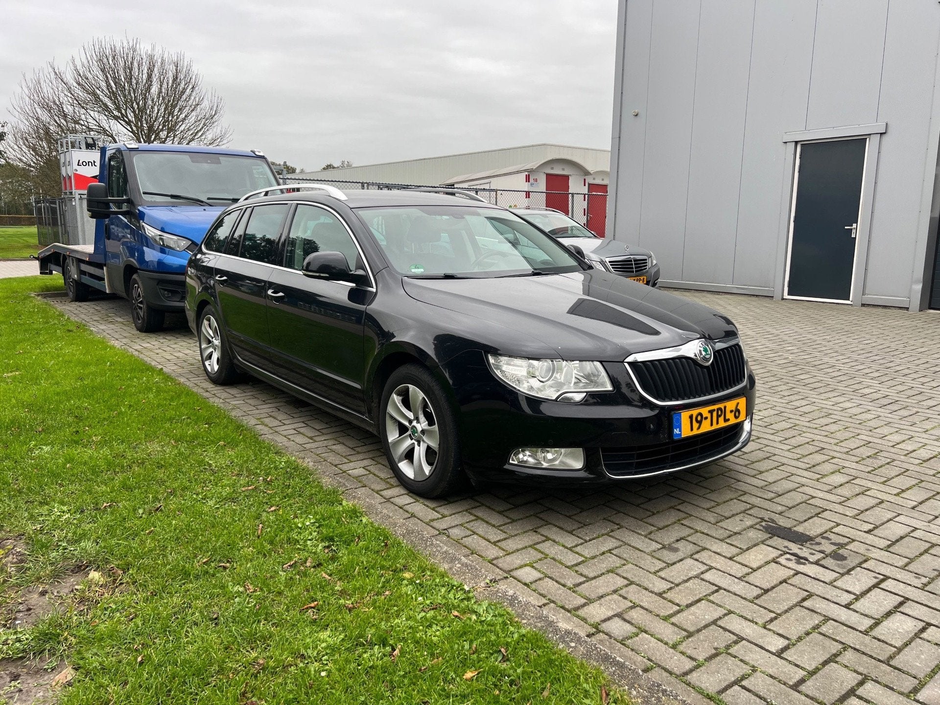 Skoda Superb Combi 1.6 TDI Ambition | Leder | Xenon | Climat, Auto's, Voorwielaandrijving, Euro 5, Stof, Gebruikt