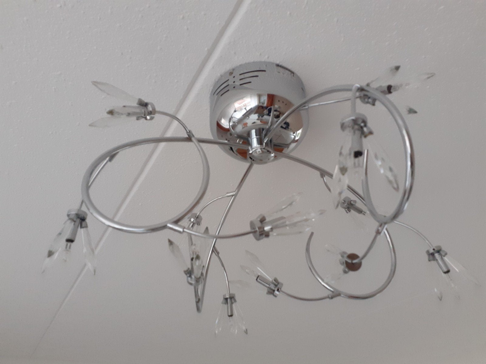 zilverkleurige plafondlamp, Ophalen