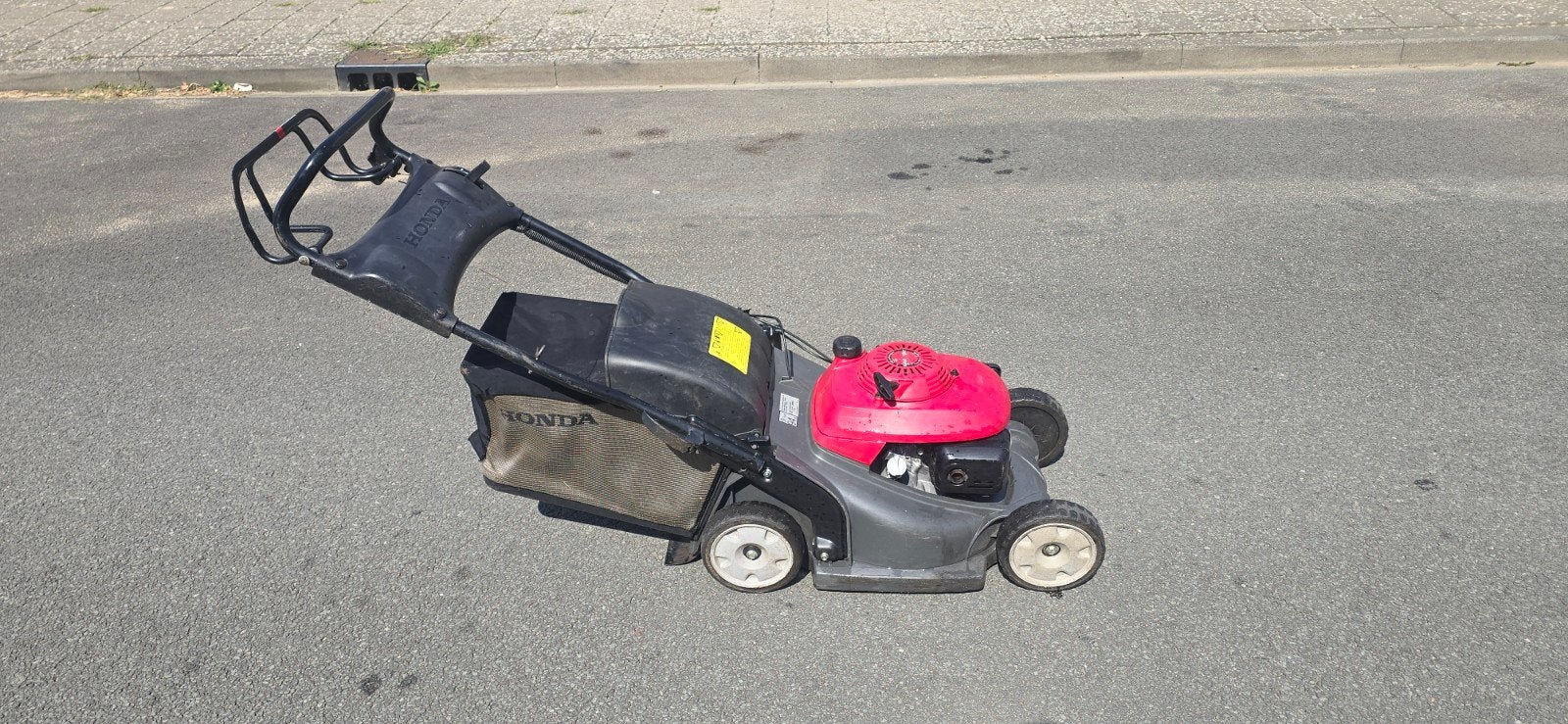 Honda grasmaaier, Ophalen