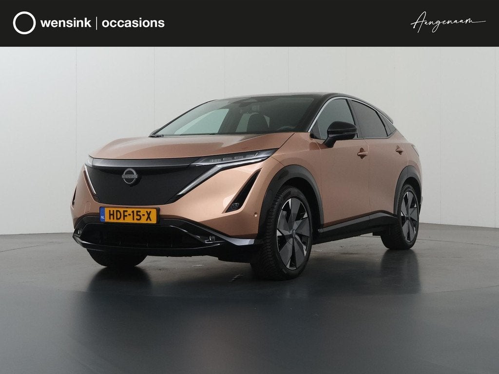 Nissan Ariya Trend Plus 91 kWh | SOH 99% | Trekhaak | Elektr, Auto's, Nissan, Lichtsensor, Gebruikt, Bruin, Ariya