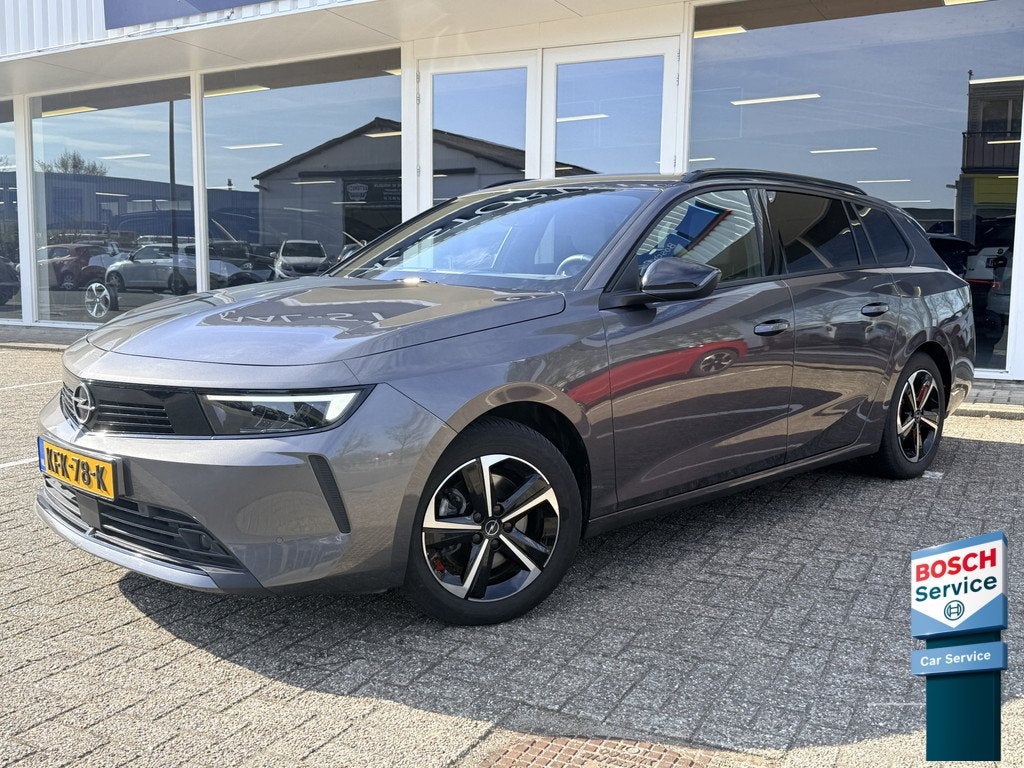 Opel Astra Sports Tourer 1.2 Turbo Hybrid Business Edition |, Auto's, Opel, 136 pk, 1199 cc, Leder en Stof, Hybride Elektrisch/Benzine