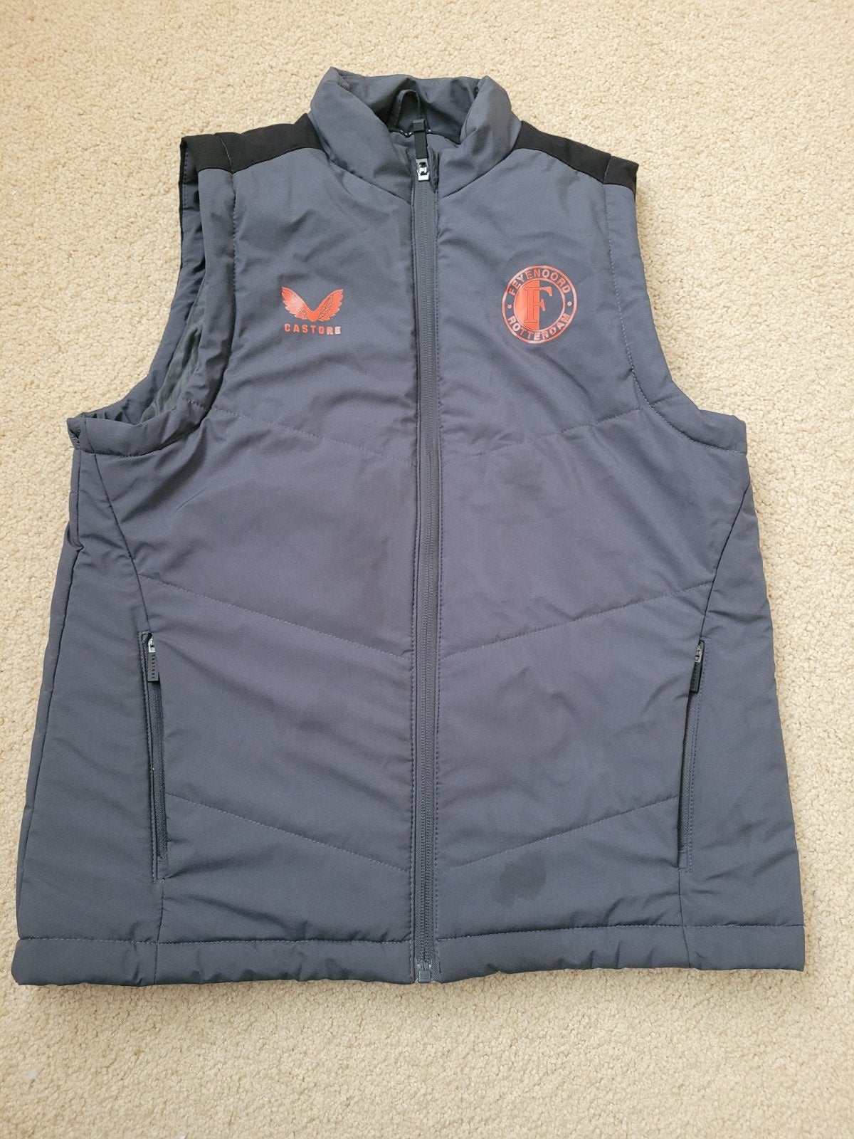 Castore Feijenoord bodywarmer maat 158cm, Gebruikt, Castore, Jongen of Meisje, Ophalen of Verzenden