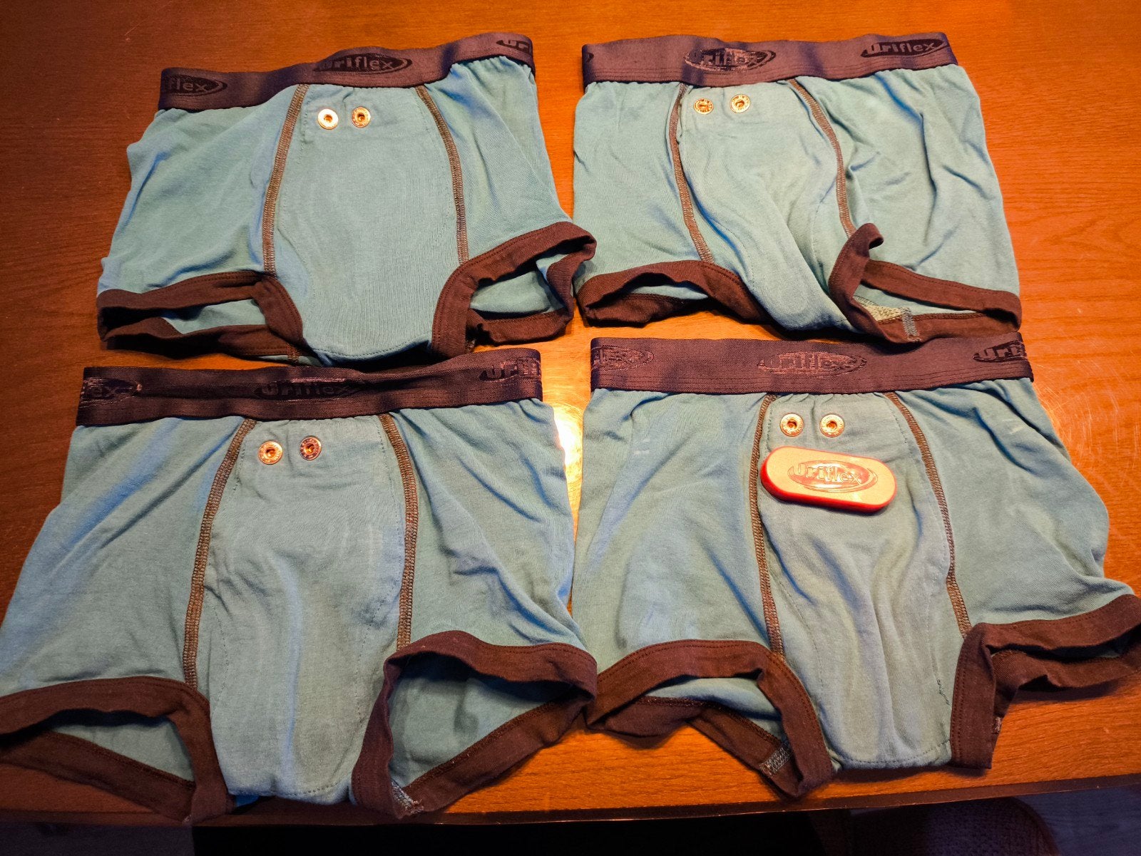 Urifoon plaswekker Contessa met 4 broekjes maat 128, Ophalen, Gebruikt