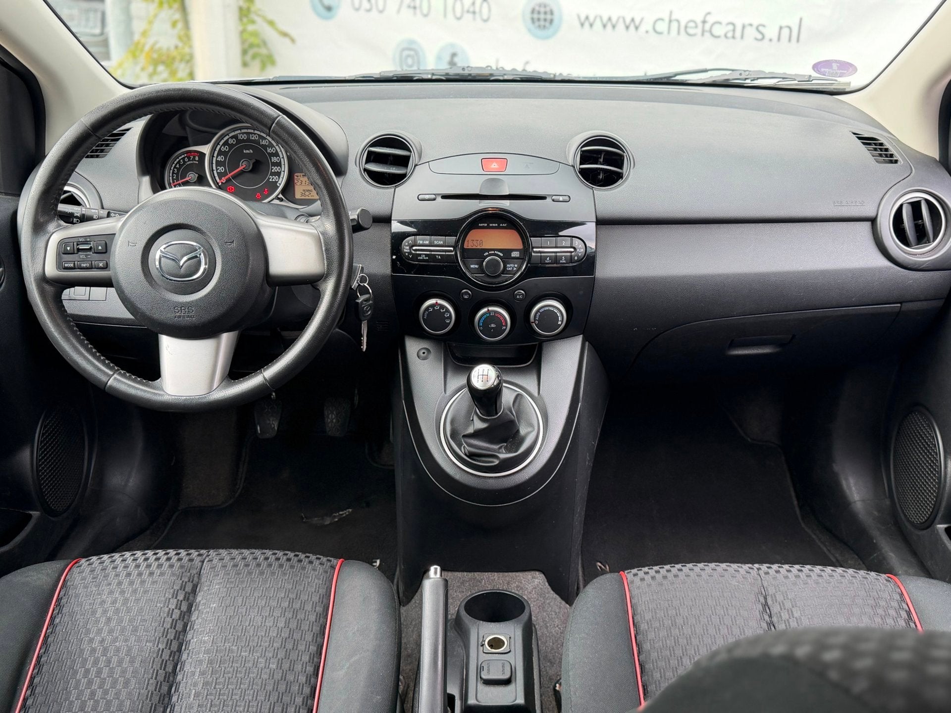 Mazda 2 1.3 GT|NAP|AIRCO|5DEURS|BOEKJES|STOELVW|LM|TREKHAAK!, Voorwielaandrijving, Euro 5, Zwart, 4 cilinders