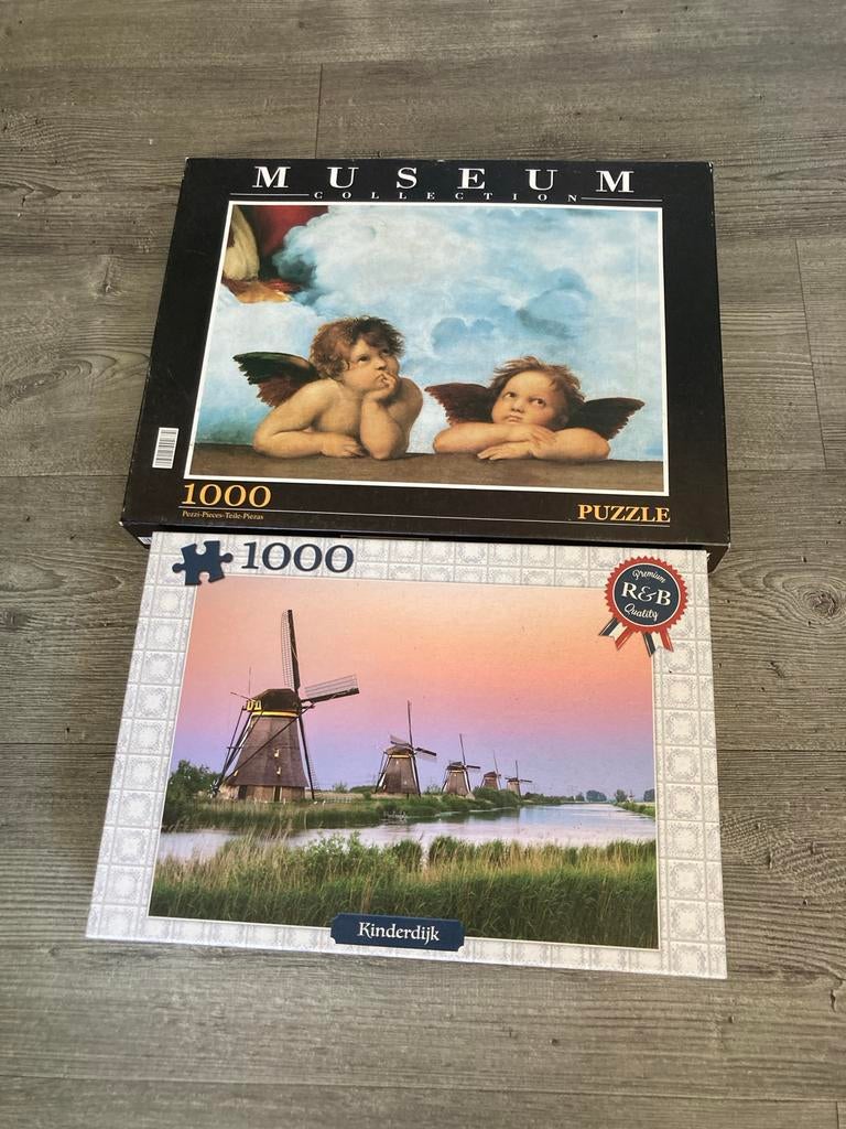 2 Legpuzzels van 1000 stukjes: Engelen & Kinderdijk, Ophalen of Verzenden, 500 t/m 1500 stukjes, Gebruikt, Legpuzzel