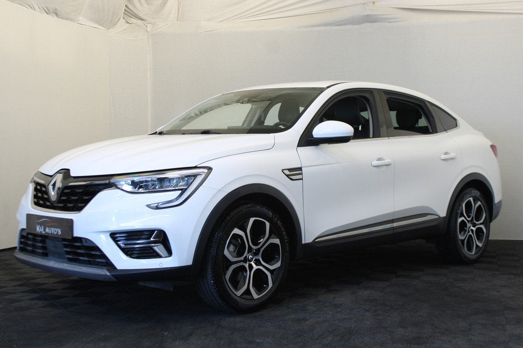 Renault Arkana 1.6 E-Tech Hybrid 145 Intens Groot navi, Auto's, Renault, Arkana, Stof, Gebruikt, Zwart
