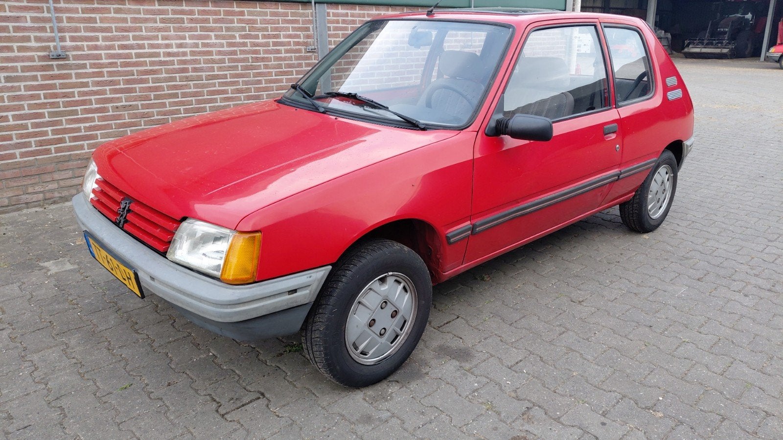Peugeot 205 1.1 XE S6 1988 Rood, Auto's, Voorwielaandrijving, 54 pk, 4 cilinders, Origineel Nederlands