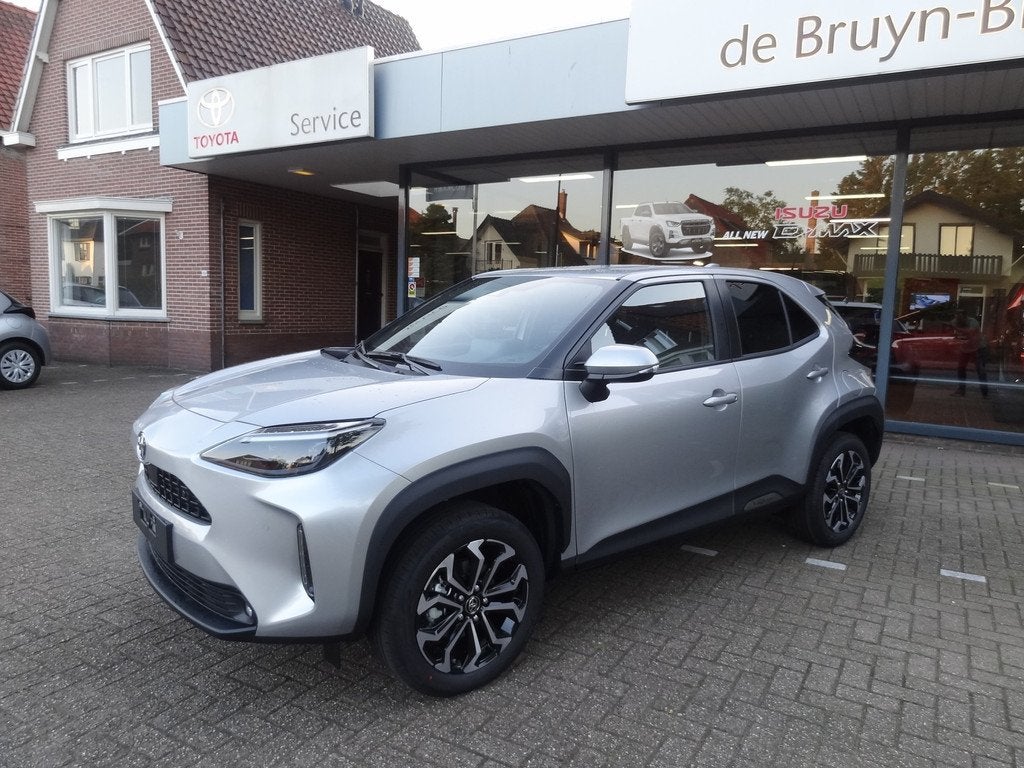 Toyota Yaris Cross 1.5 Hybrid 130pk Dynamic + Comfort Pack d, Stof, Gebruikt, 24 maanden, 1490 cc