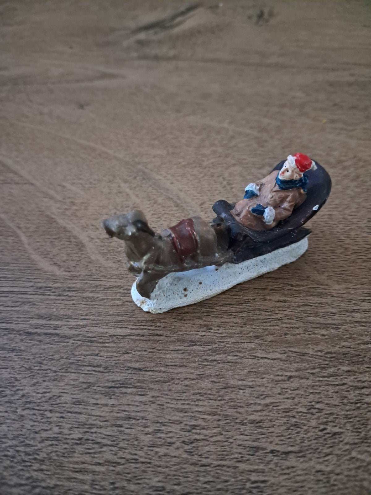 man in slee met paard, Ophalen