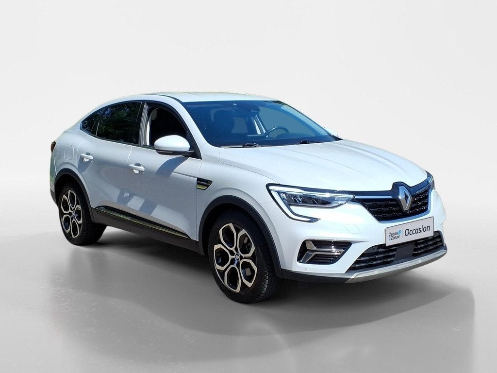 Renault Arkana 1.6 E-Tech Hybrid 145 Intens Automaat, Auto's, Renault, Gebruikt, Leder en Stof, Wit, Origineel Nederlands