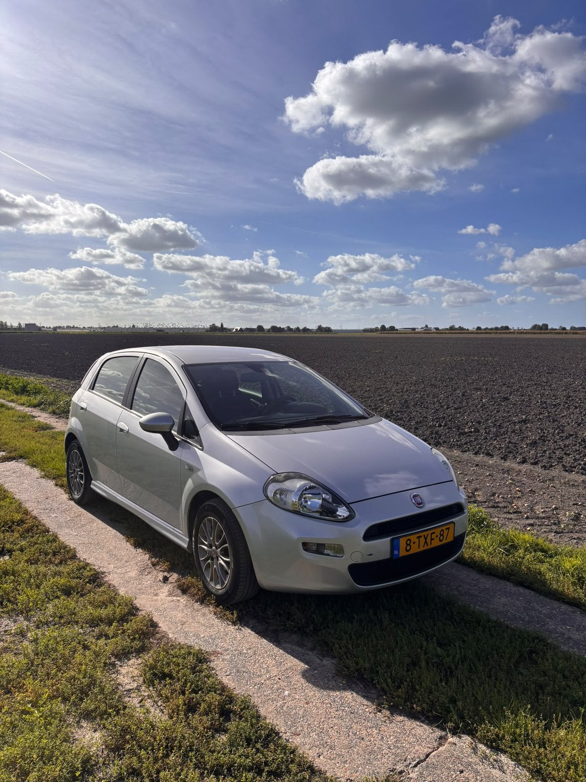 Fiat Punto 0.9 Twinair 74KW 5DR 2014 Grijs, Voorwielaandrijving, 100 pk, 49 €/maand, Origineel Nederlands