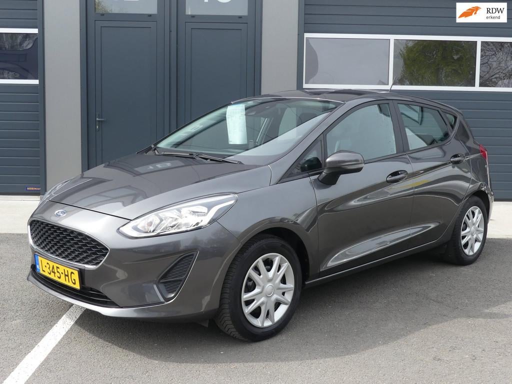 Ford Fiesta 1.1 Climate Control Cruise Control 5-Drs Dealer, Voorwielaandrijving, Stof, Lichtsensor, Bedrijf