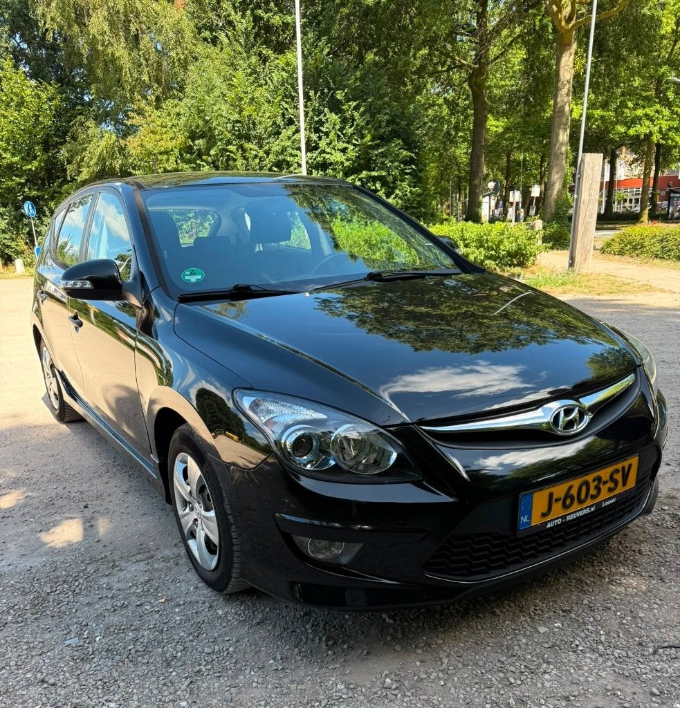 Hyundai i30 1.4 I Cvvt 5DR 2011 Zwart, Auto's, Voorwielaandrijving, Euro 5, Stof, Zwart