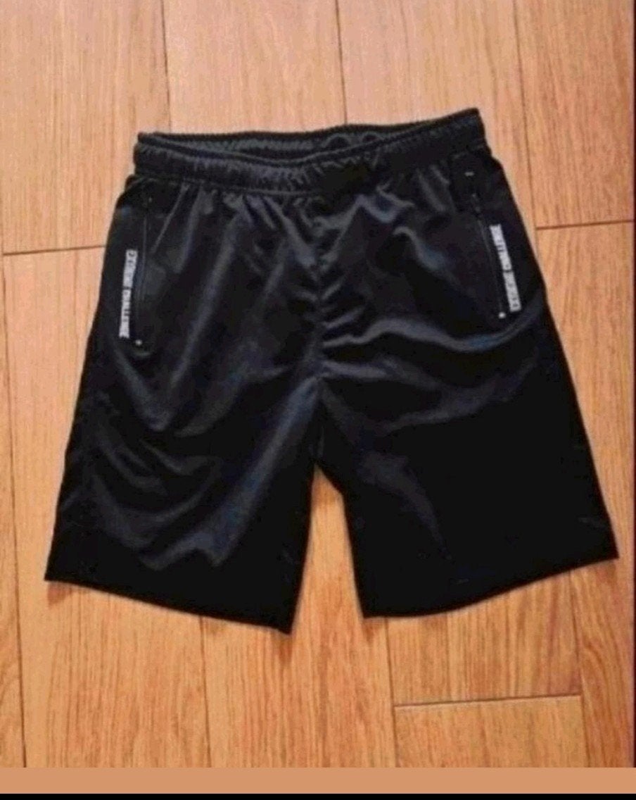 Zwart short maat 146-152, Ophalen of Verzenden, Zo goed als nieuw, Jongen, Sport- of Zwemkleding