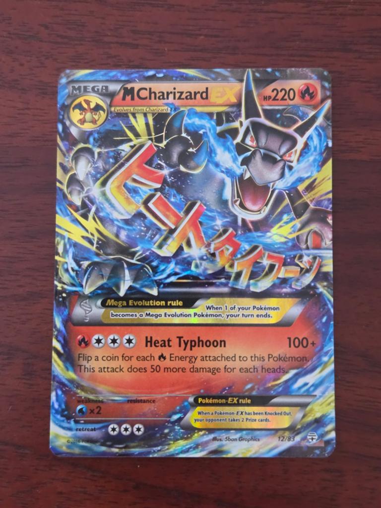 M Charizard ex 12/83, Ophalen of Verzenden, Zo goed als nieuw, Losse kaart, Foil