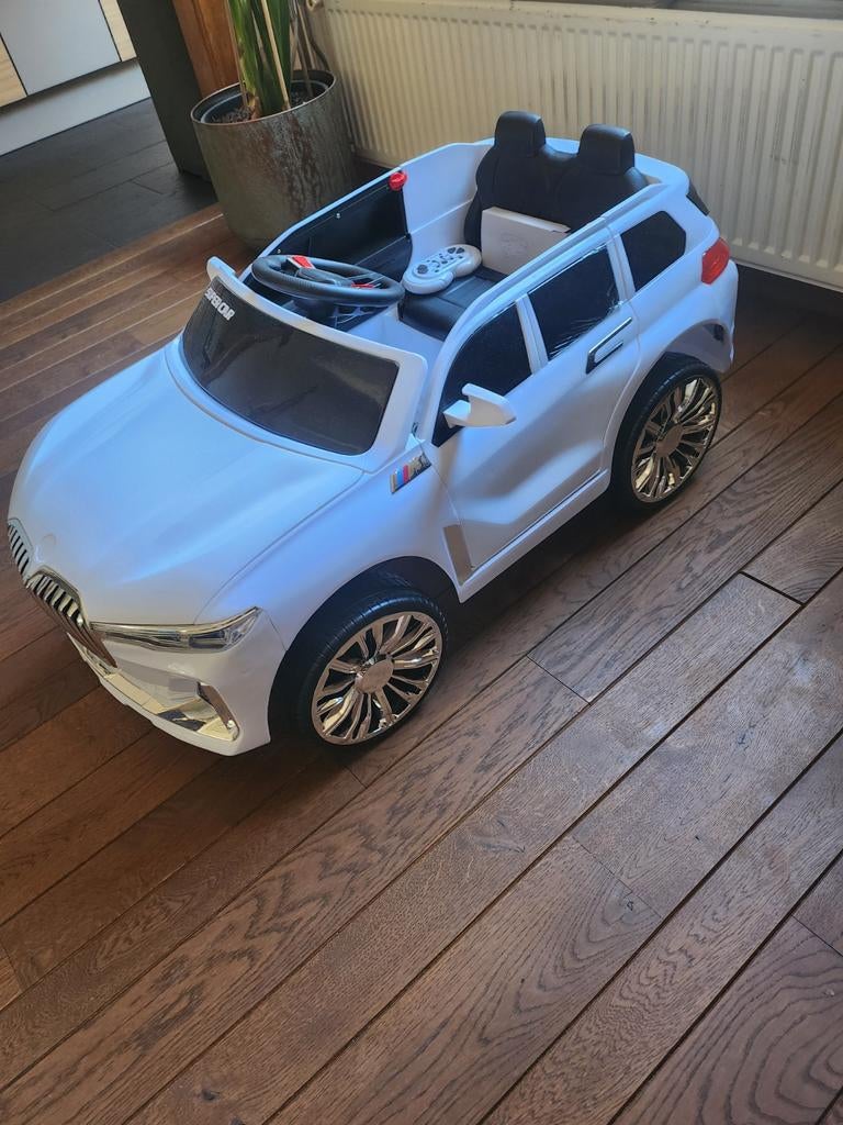 Elektrische kinderauto blauwe BMW X7 met afstandsbediening, Ophalen, Zo goed als nieuw, Afstandsbediening