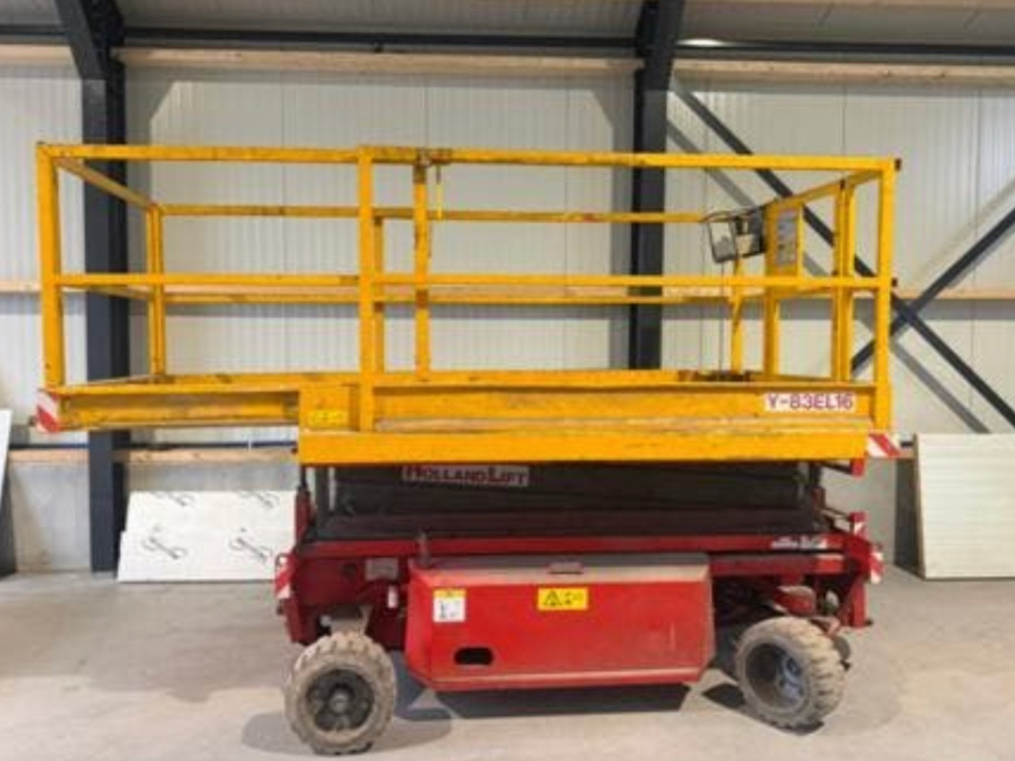 Holland Lift Y-83EL16 Schaarhoogwerker INRUIL BESPREEKBAAR, Ophalen of Verzenden