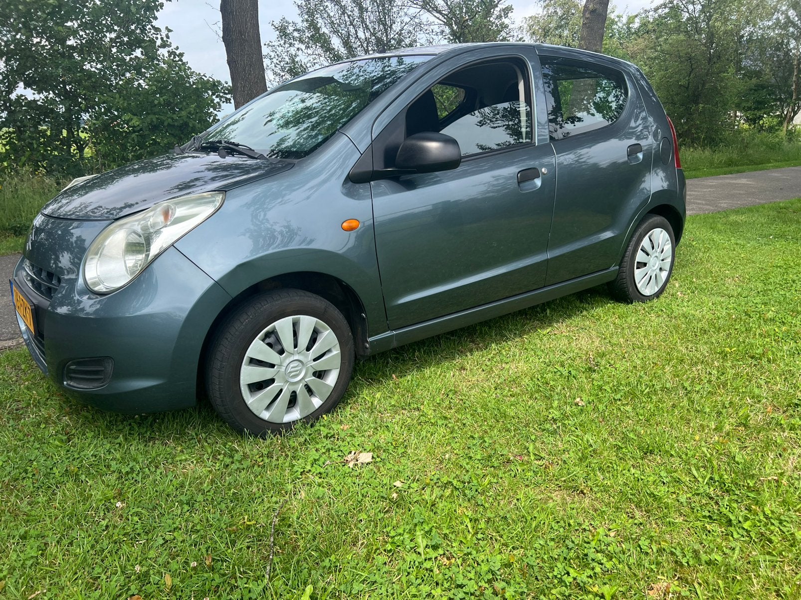 Suzuki Alto 1.0 2011 Wit, Voorwielaandrijving, Euro 5, Stof, Overige kleuren