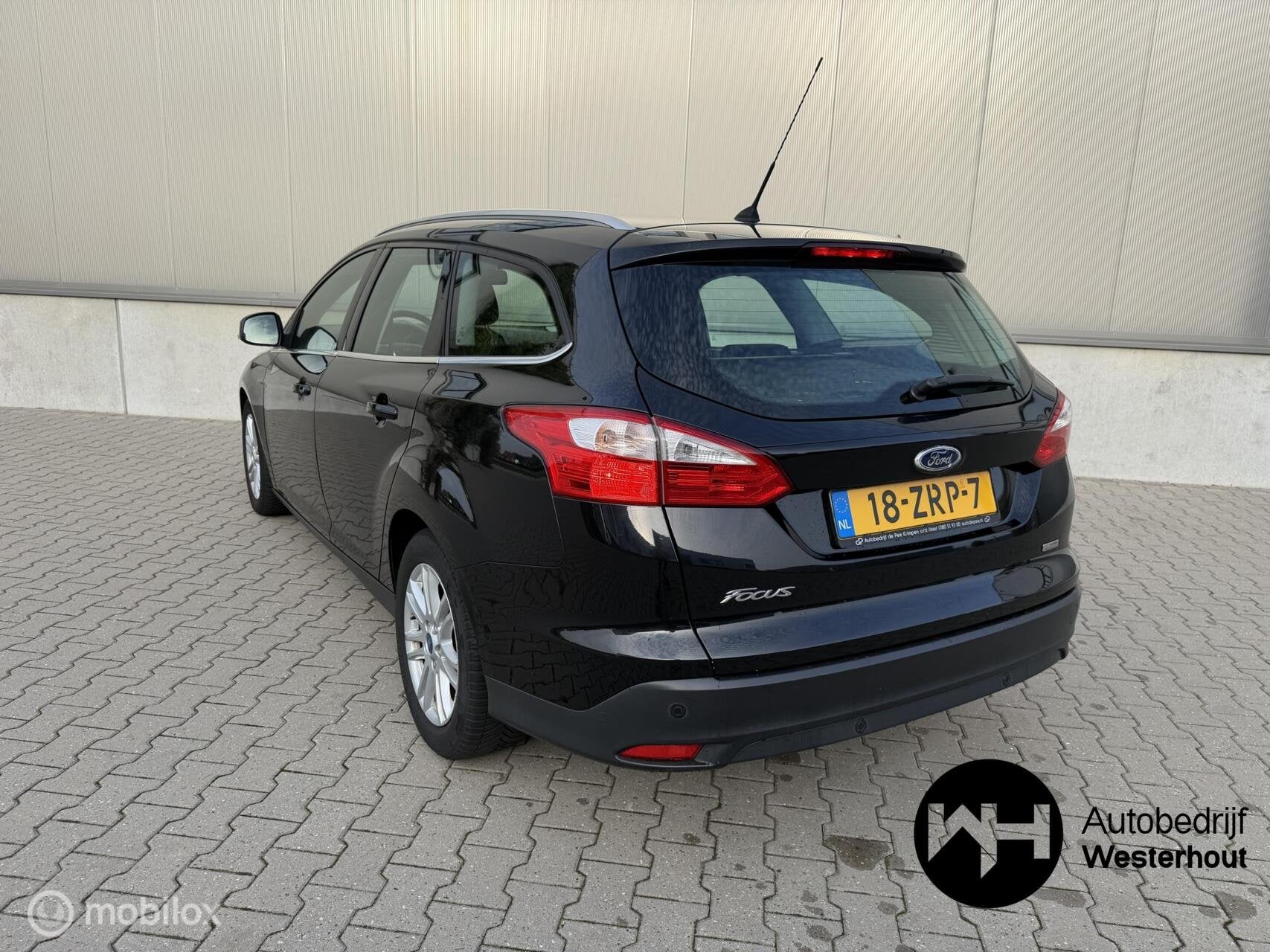 Ford Focus Wagon 1.0 EcoBoost Titanium|PARKEERSENSOREN|NAVI, Auto's, Euro 5, 125 pk, Gebruikt, Zwart