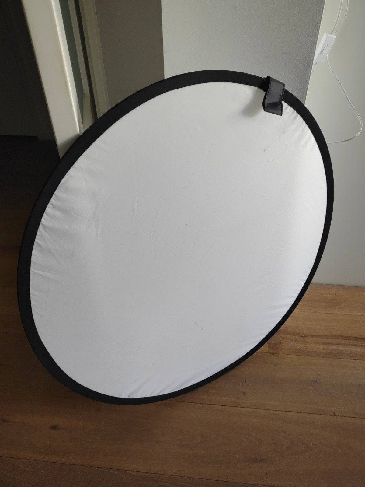 Reflectiescherm voor zacht en schoon licht in fotografie, Ophalen